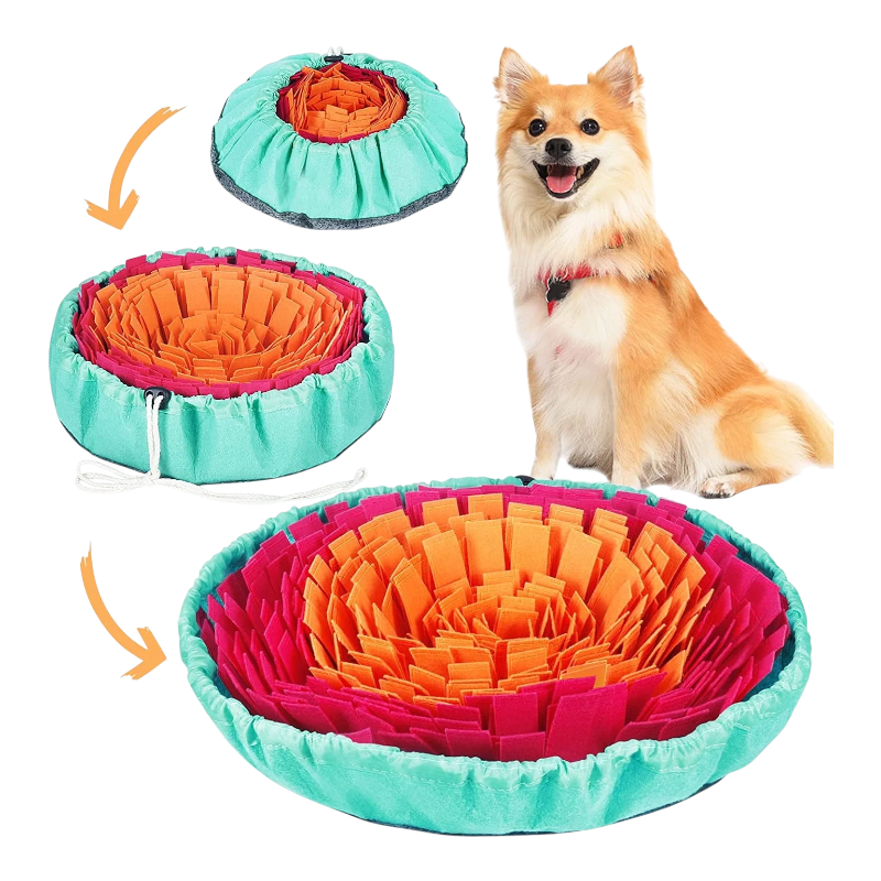 Snuffle mat for dogs teal outer with layered pink and orange fleece convertible drawstring bowl shown with happy dog